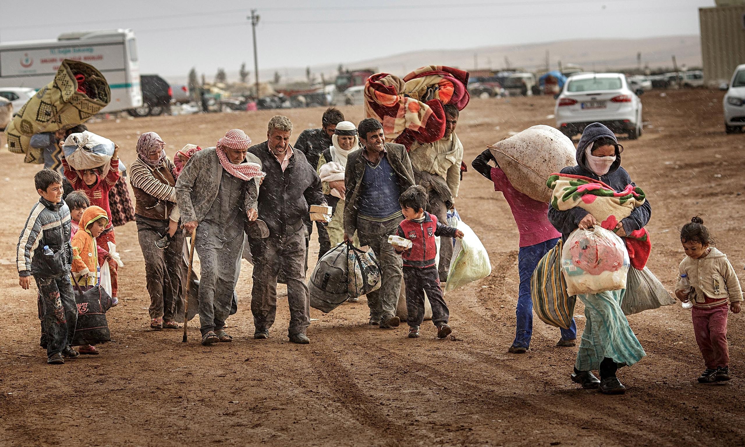 В Сирию за сутки вернулись более 1,4 тысячи беженцев - МО РФ
