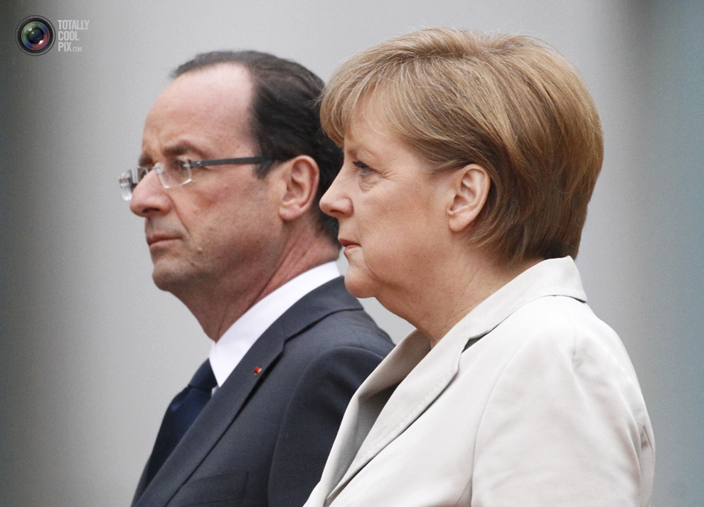 Меркель и Олланд летят в Киев и Москву на переговоры  